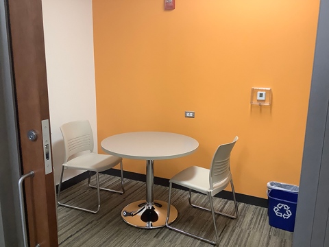 Photo of Study Room 2, with a small round table and two chairs.