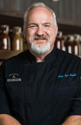 Middle aged white man, headshot of Chef Art Smith