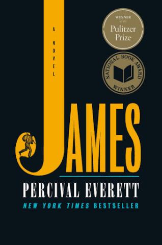 Gold letters on black cover with a small picture of a man with a knapsack over his shoulder on the seraph of the J